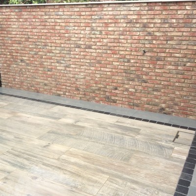 Symphony Vetrified Plank Paving with Black Setts and Bullnose Steps